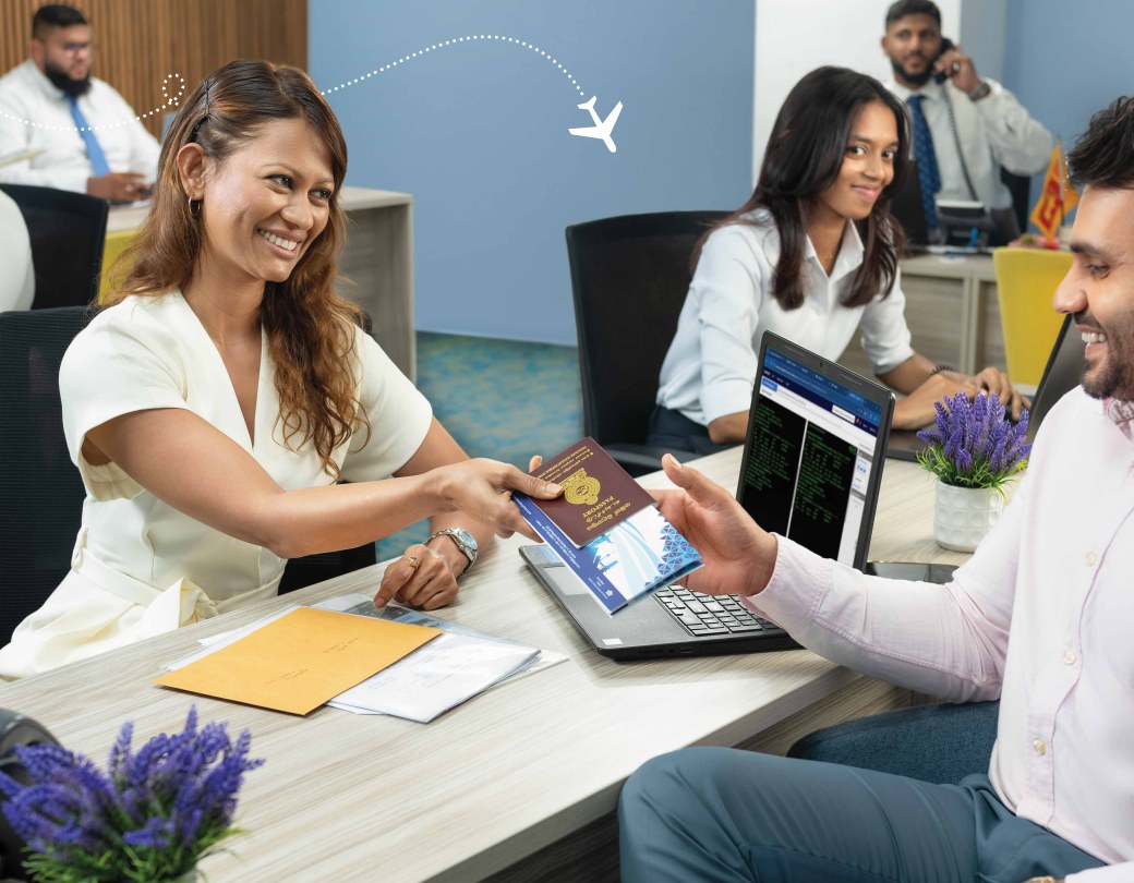 A Traveller Global consultant helping a customer with their travel documents